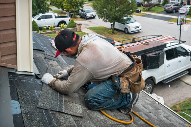 Professional Hail Damage Roof Repair technician working in Hollywood, MD